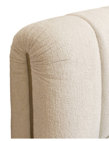 Cama tapizada beige con cabecero...