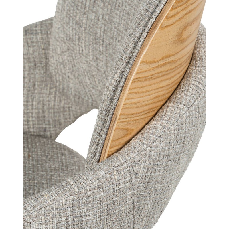 Silla de comedor Nur giratoria tapizada con patas curvadas de madera y respaldo de roble