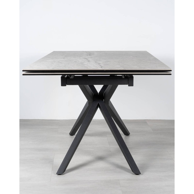 Mesa Titan extensible cerámica gris piedra con apertura lateral y patas cruzadas 160/240cm