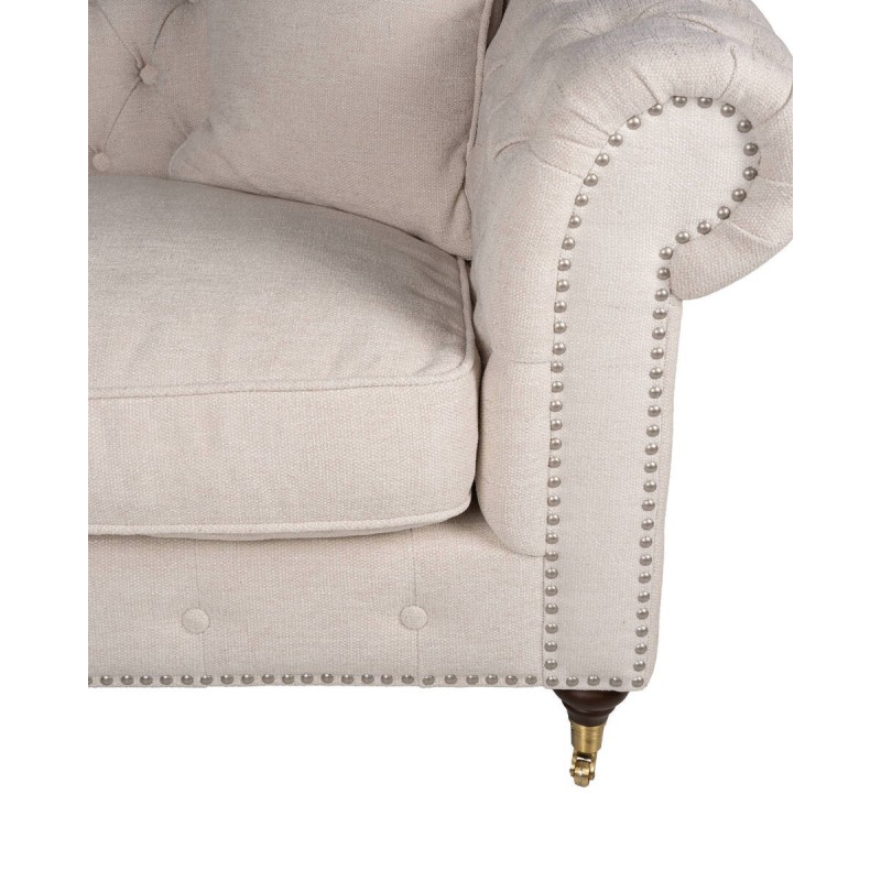 Beige silhouette sofa with front wheels, button tufting and studs, 229x96x76 cm