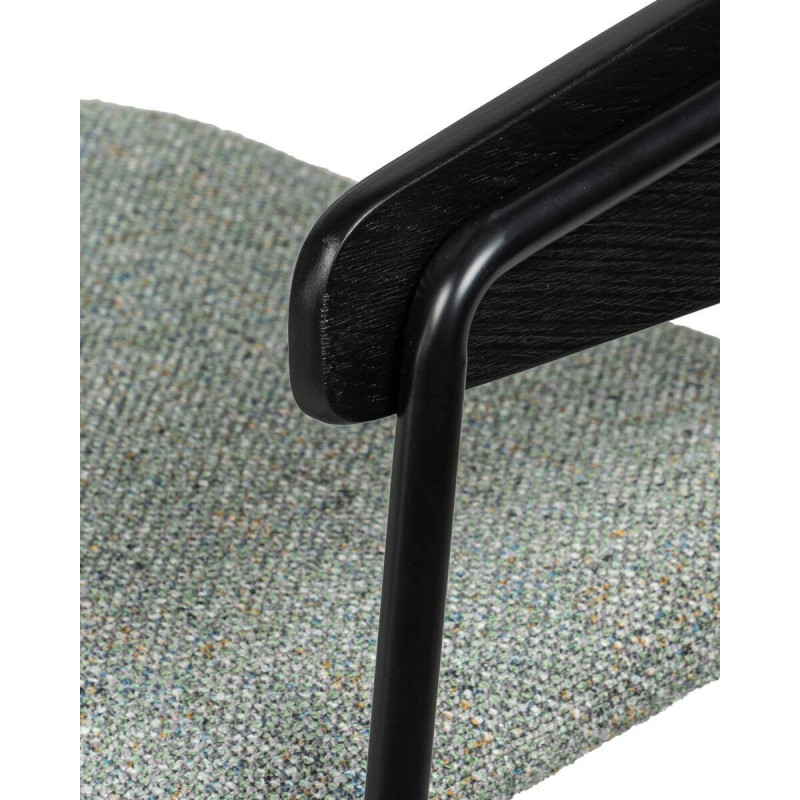Axil dining chair with wrap-around backrest in black wood and green upholstery