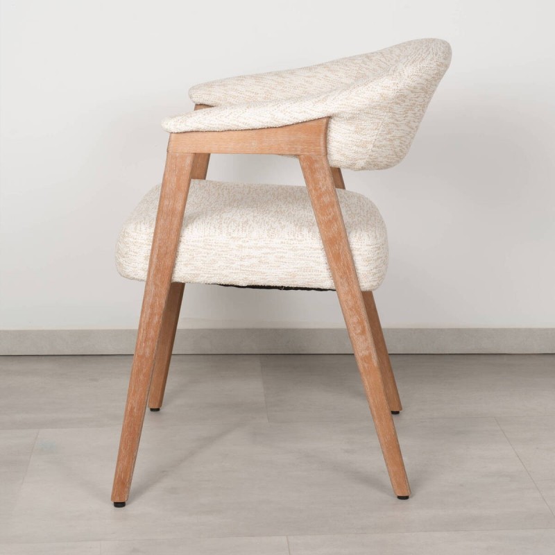 Noor dining chair upholstered in beige fabric with bleached wood frame
