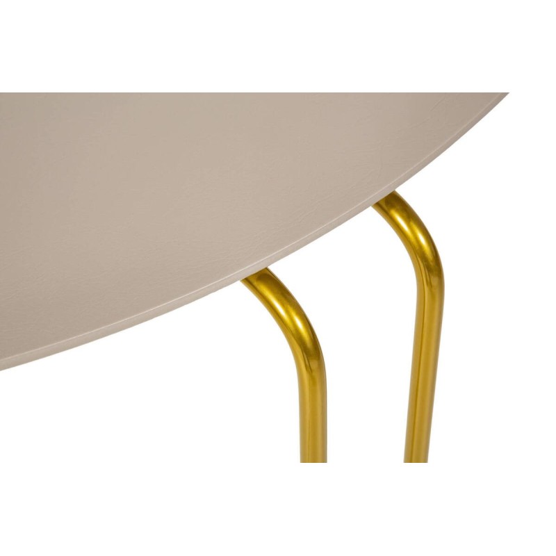 Round coffee table with gold legs and a gray top