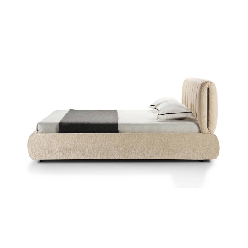 Beige upholstered bed with padded headboard 180x200