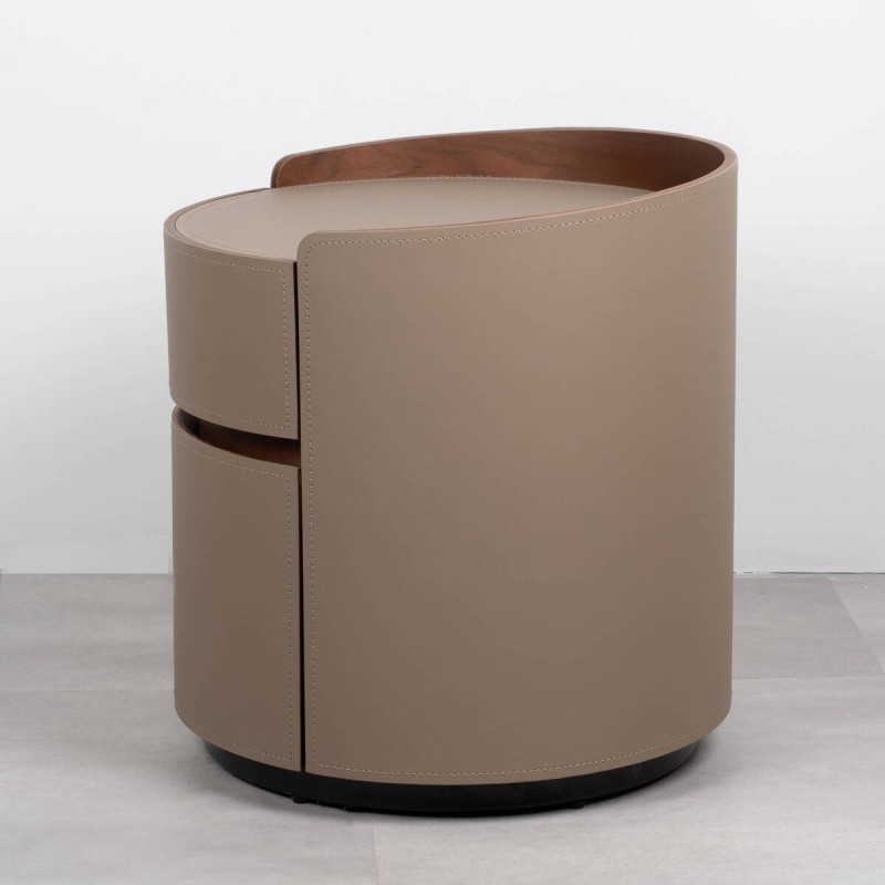 Round Silk bedside table upholstered in leather with two drawers