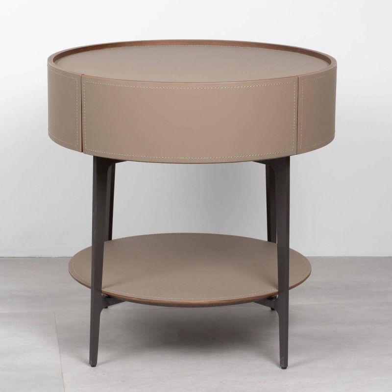 Velia round bedside table upholstered in leather with metal legs