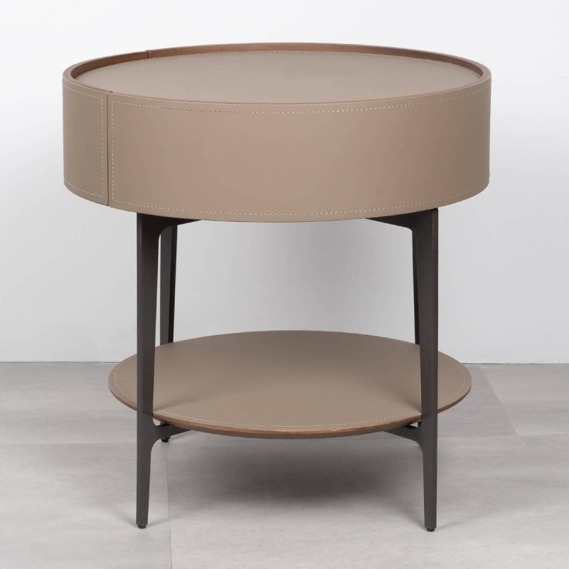 Velia round bedside table upholstered in leather with metal legs