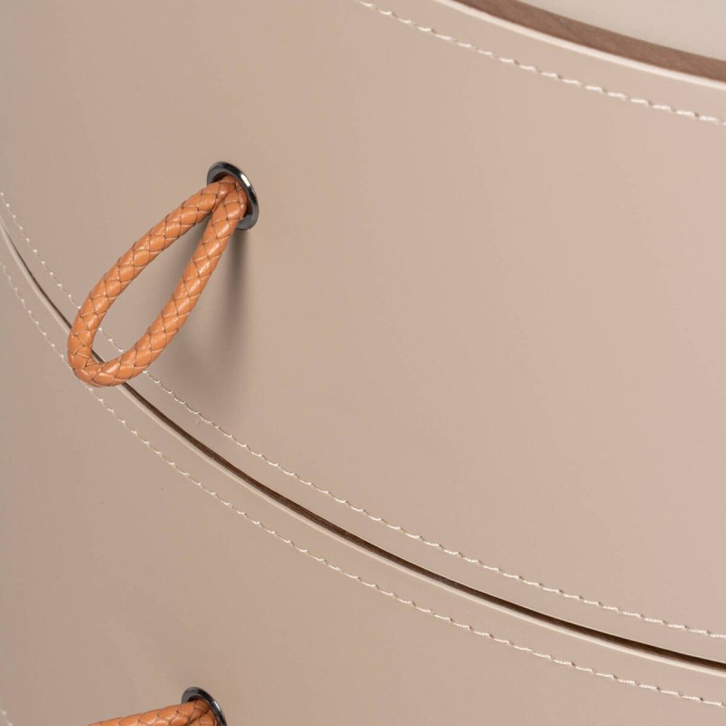Velien round bedside table upholstered in leather with three drawers