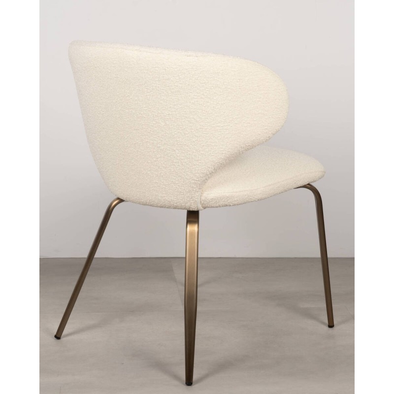 Amelie chair upholstered in white sheepskin with metallic bronze legs