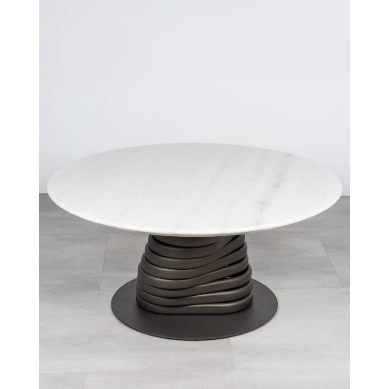 Aureum round coffee table in white marble with a wavy base