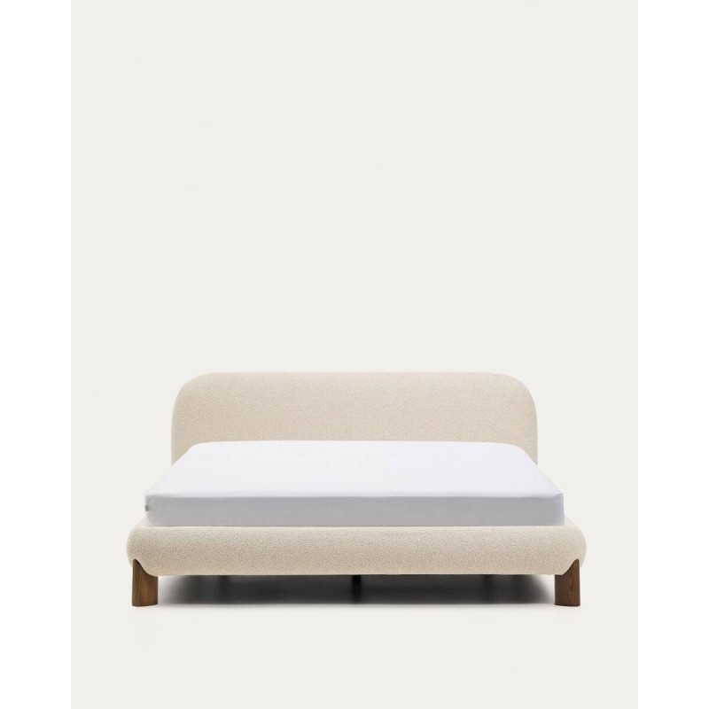 Odina bed with removable cover, raw bouclé fabric and solid ash wood legs with a walnut finish for a 160 x 200 cm mattress.
