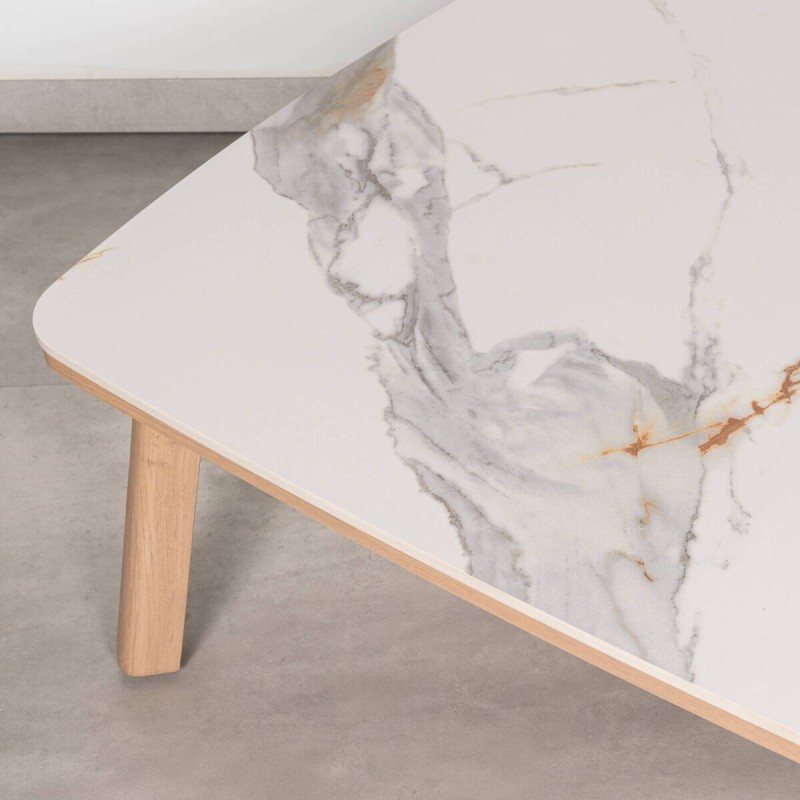 Rail outdoor coffee table with a marble-effect sintered stone top and wooden legs.