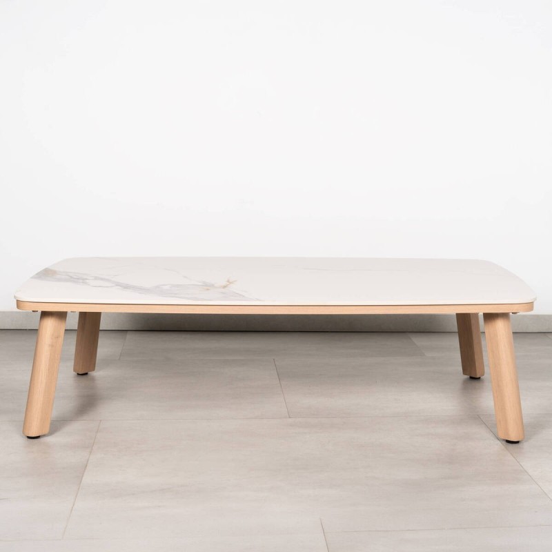 Rail outdoor coffee table with a marble-effect sintered stone top and wooden legs.