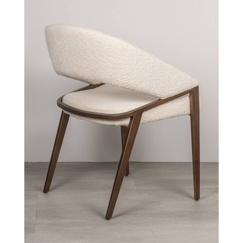 Amara bouclé chair in beige with brushed bronze legs