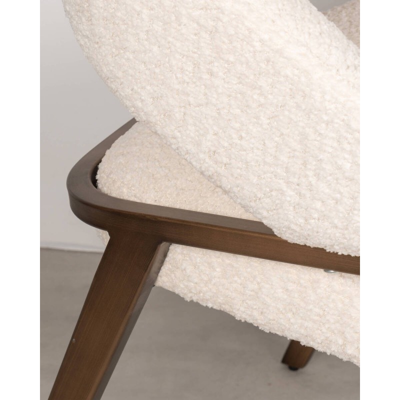 Amara bouclé chair in beige with brushed bronze legs