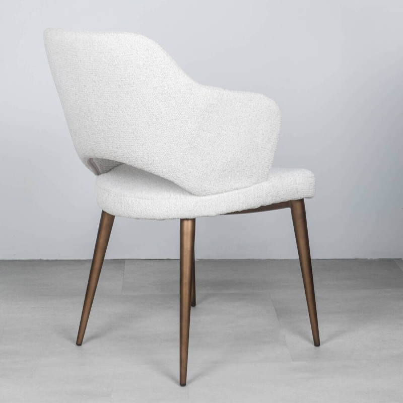 Elin chair upholstered in cream with bronze metal legs