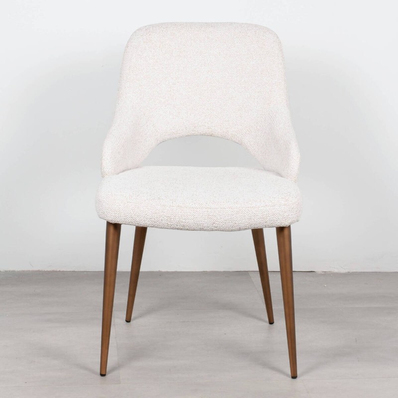 Liva chair upholstered in beige with armrests and metal legs