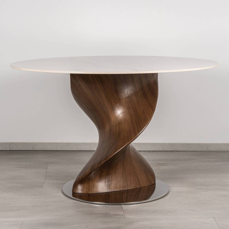 Mesa redonda mistral de cerámica con base escultórica en nogal 120x76cm