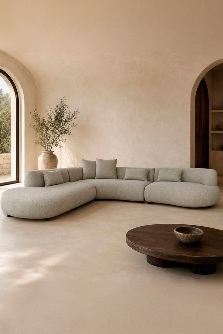 Modular beige sofa in contemporary living room setting
